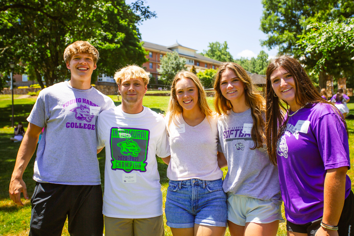 a group of people posing for a photo