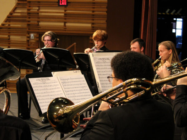 a group of people playing instruments