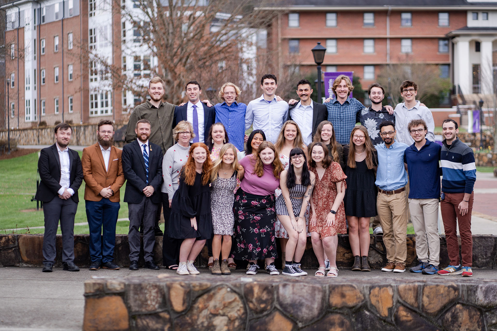 a group of people posing for a photo