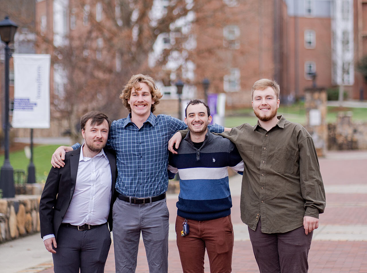 a group of people posing for a photo