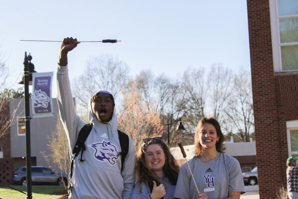 a group of people posing for the camera