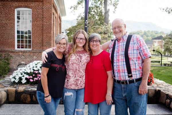 a group of people posing for a photo