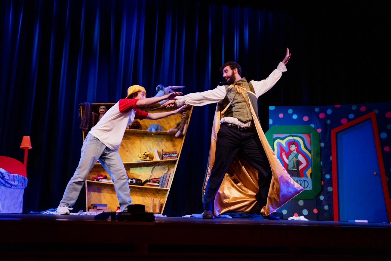 a man and woman performing on a stage