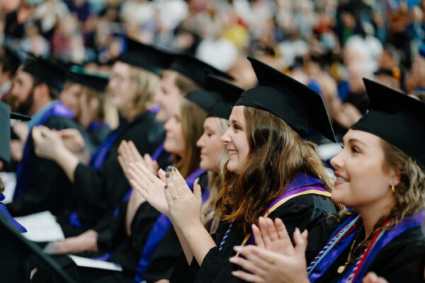 a group of people in graduation gowns