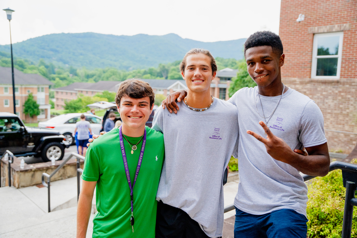 a group of people posing for the camera