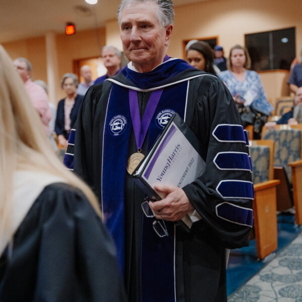 a person in a graduation gown