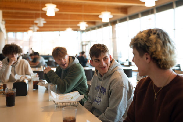 a group of people sitting at a table