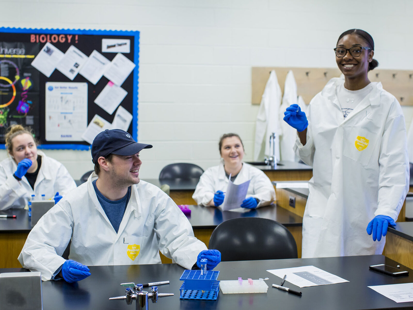 a few people in lab coats