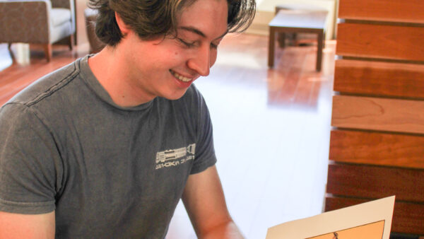 a man looking at a book