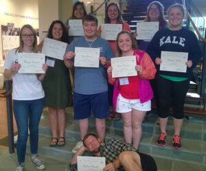 Students holding awards