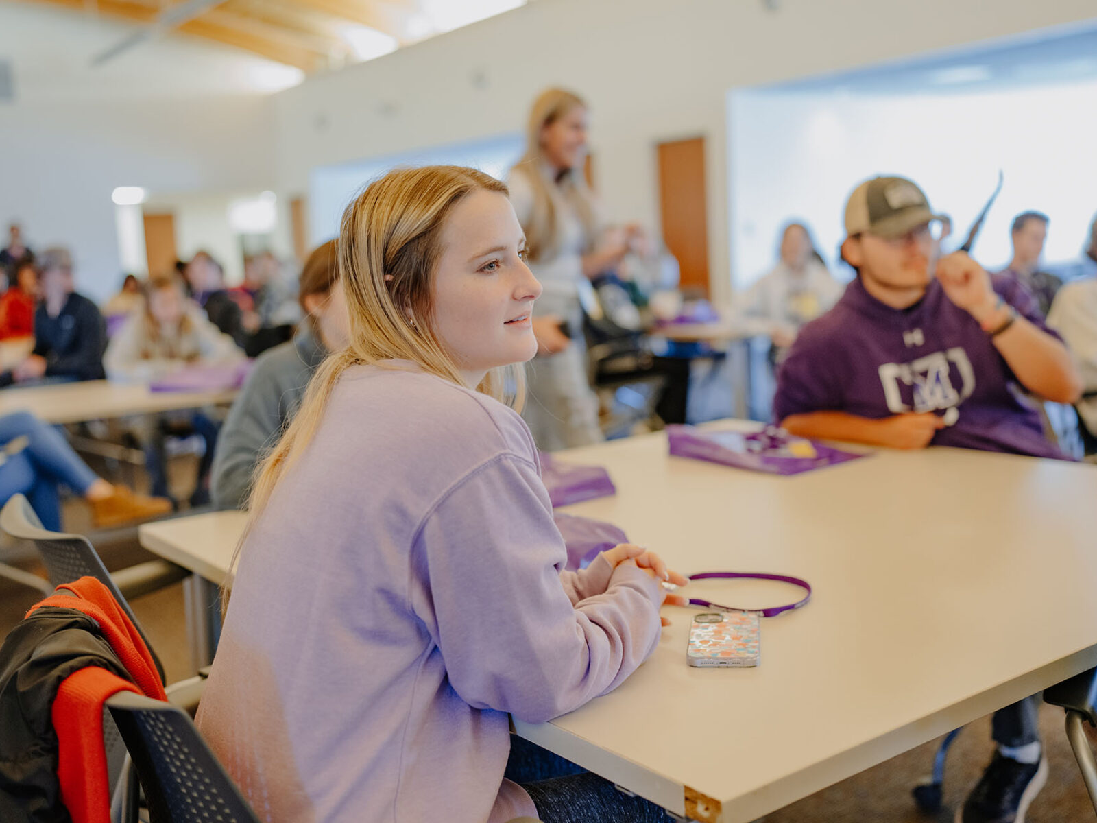 a group of people in a classroom