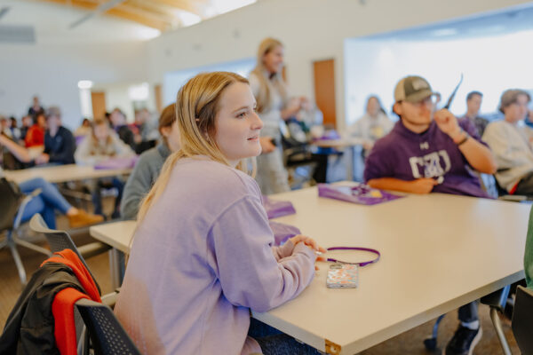 a group of people in a classroom