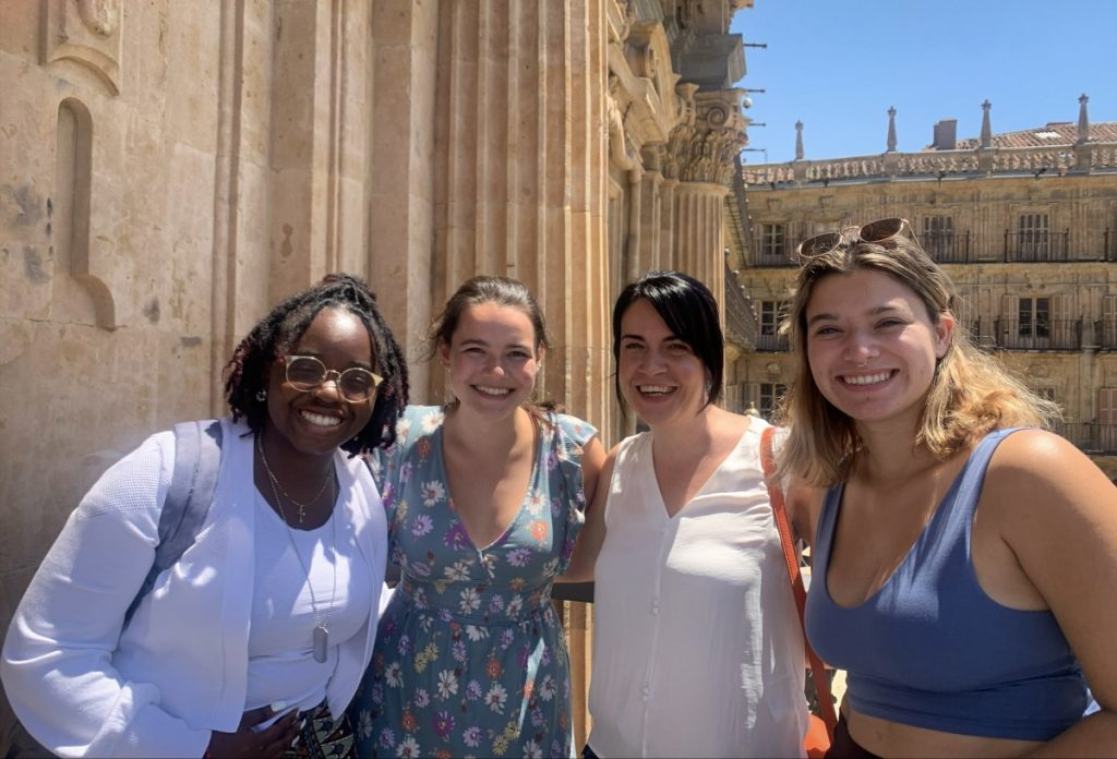 a group of women posing for a photo