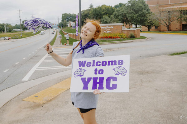 a person holding a sign