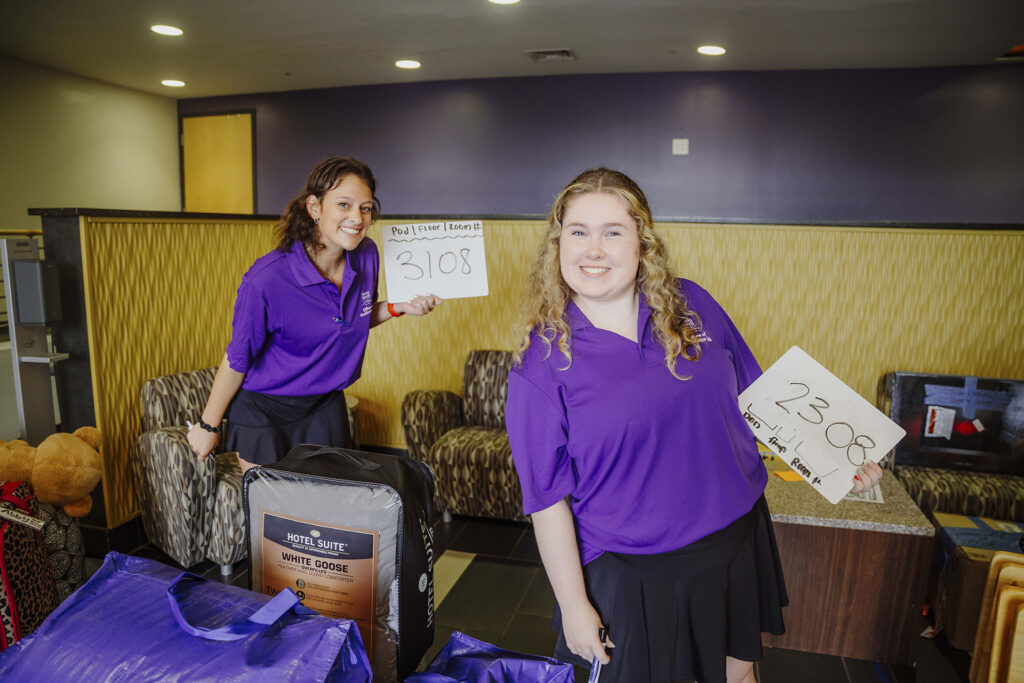 a couple of women posing for a picture